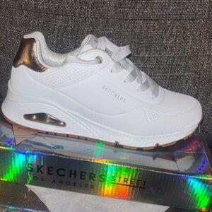 Skechers White Sneakers with Gold Highlights